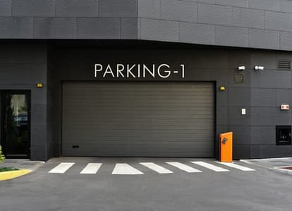 Underground parking garage attached to commercial building