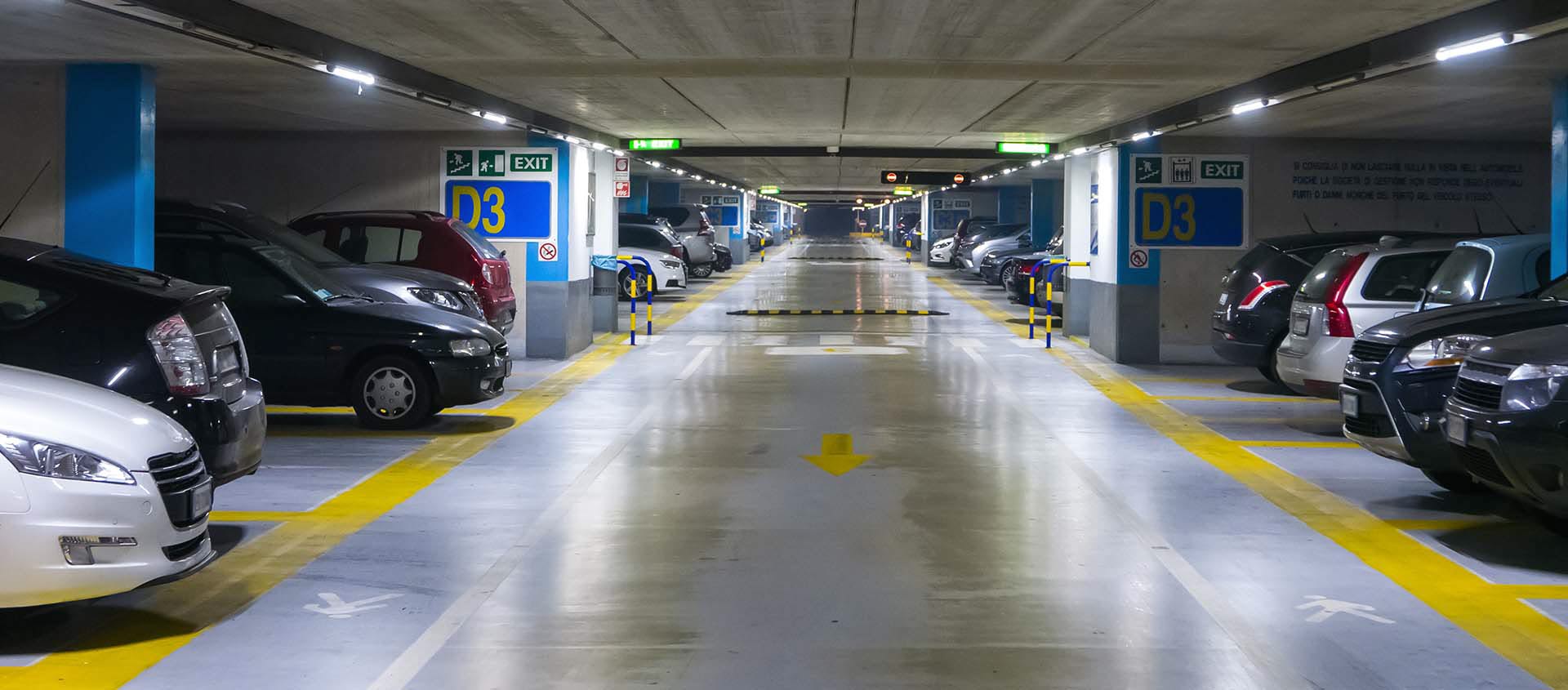 Cars parked in clean parking garage