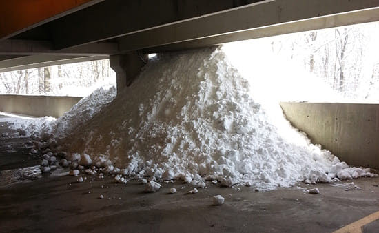Snow piled in parking garage