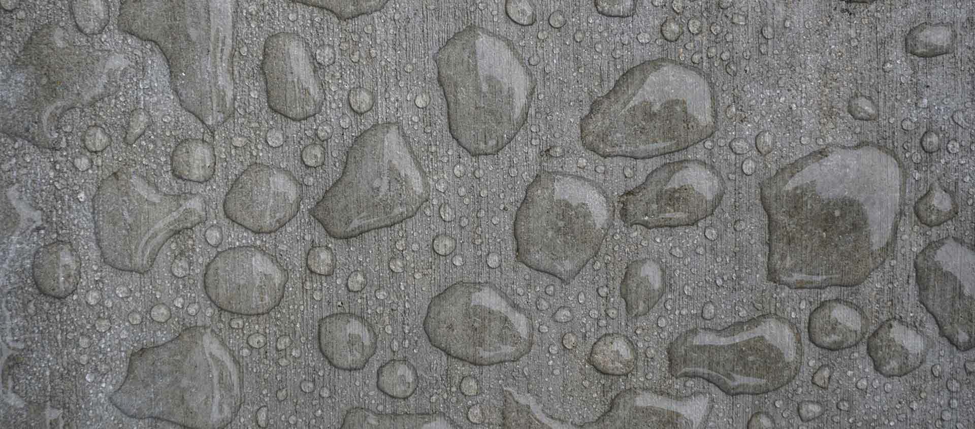 Water droplets on concrete