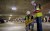 two inspectors looking at the ground of a parking garage