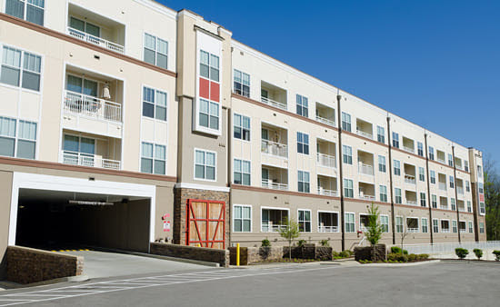 Parking garage attached to apartment building