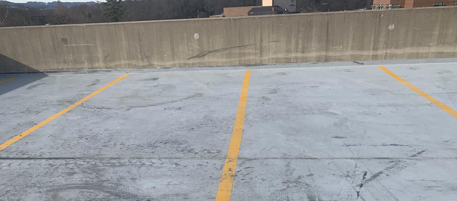 Rooftop level of parking garage exposed to sunlight
